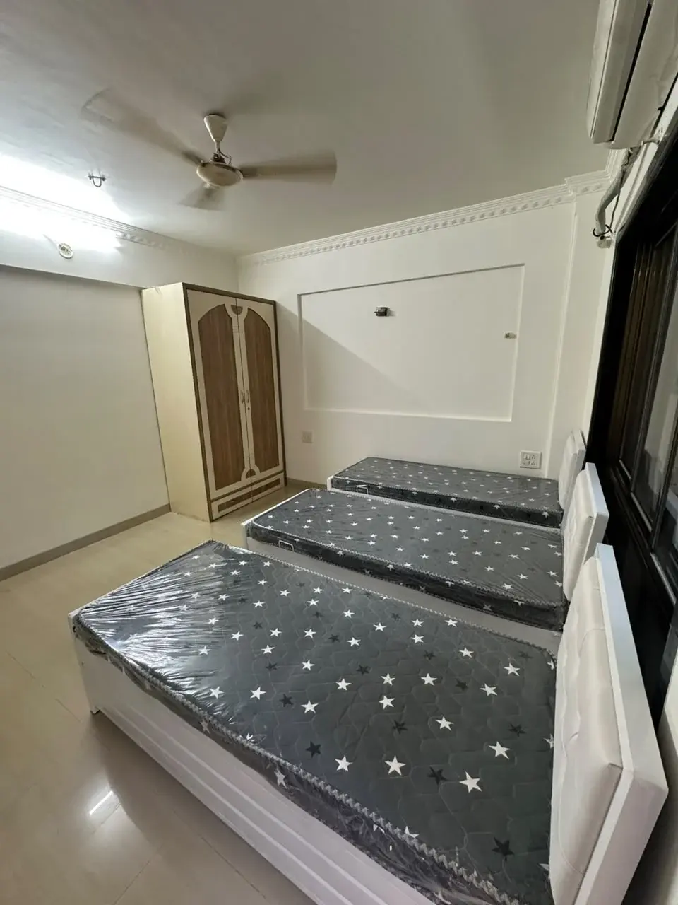 Hallway leading into furnished rooms